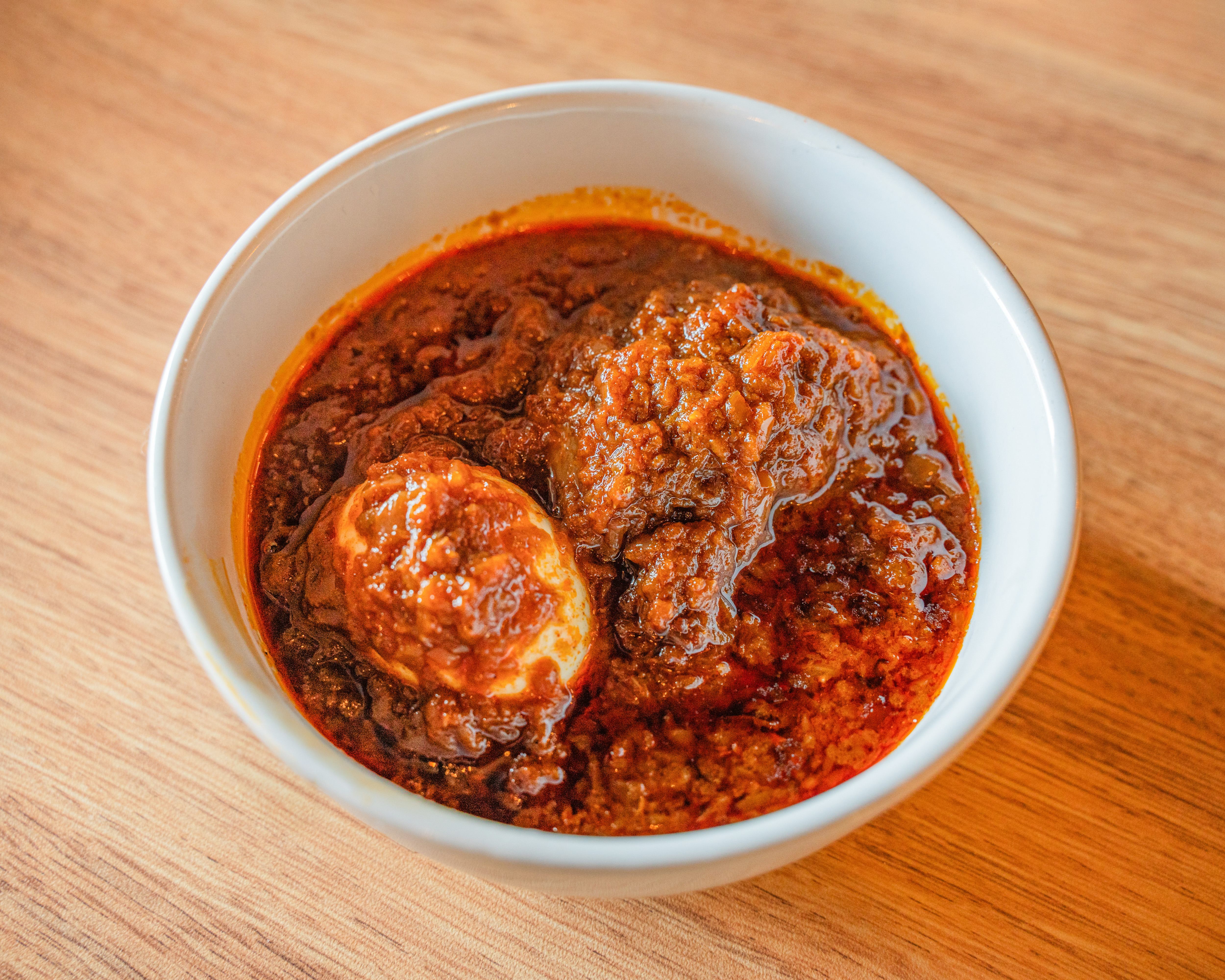 Doro Wot — slow-cooked Ethiopian chicken stew at Injera & Beyond