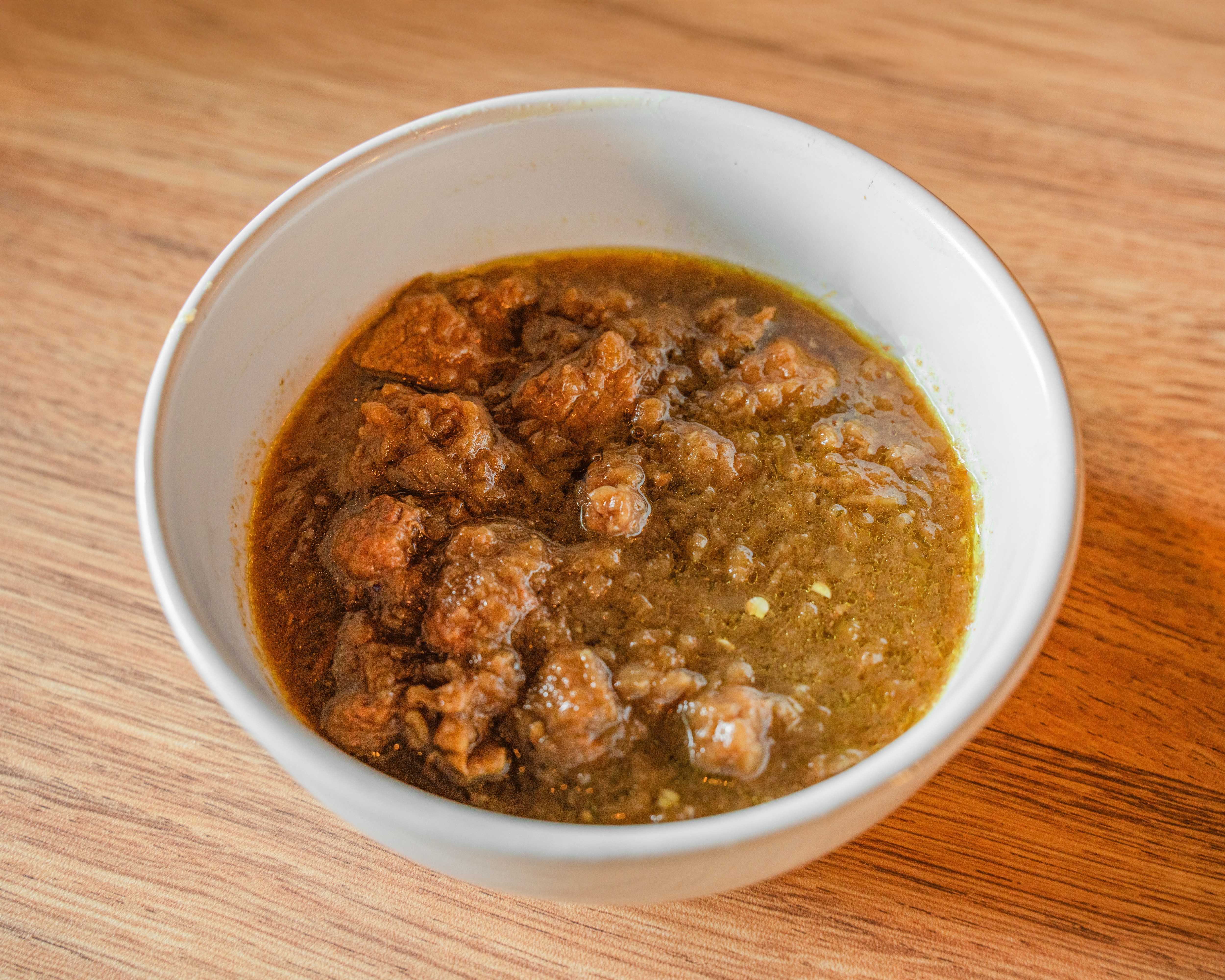 Alicha Kikil — slow-cooked lamb stew at Injera & Beyond